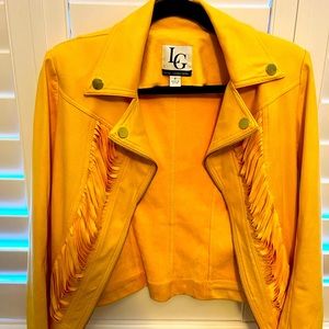 Cropped gold yellow jacket with designer detail of stripped fabric in front.